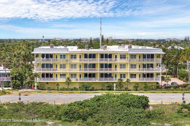 505 S Miramar Ave Unit 2403, Indialantic, FL 32903 - view of apartment building / complex with uncovered parking