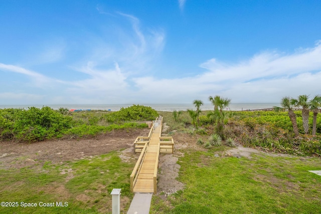 3820 Ocean Beach Blvd Unit 1, Cocoa Beach, FL 32931 - view of yard with a water view
