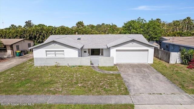 1155 Montego Bay Dr N, Merritt Island, FL 32953 - ranch-style house with a garage and driveway