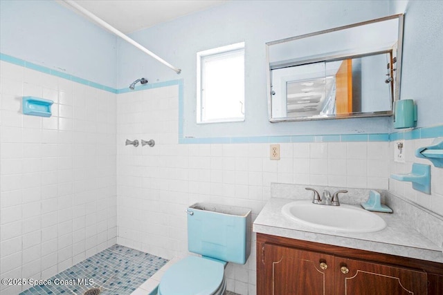 1155 Montego Bay Dr N, Merritt Island, FL 32953 - full bath with tiled shower, vanity, and tile walls