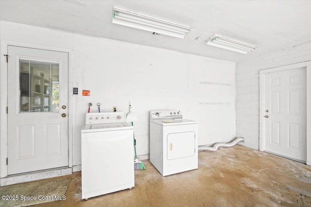 1155 Montego Bay Dr N, Merritt Island, FL 32953 - laundry room with washing machine and clothes dryer
