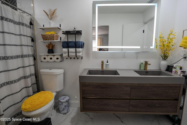 629 Tupelo Dr, Melbourne, FL 32935 - bathroom featuring marble finish floors, double vanity, toilet, baseboards, and a shower with curtain