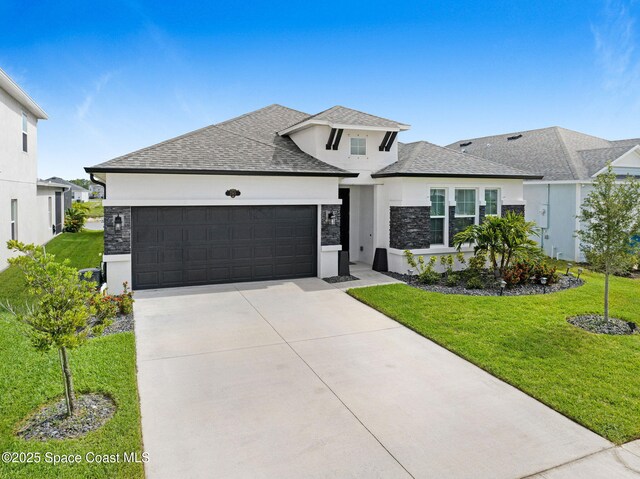 2365 Roygaris St NW, Palm Bay, FL 32907 - view of front of property with a garage, stucco siding, concrete driveway, and a front lawn
