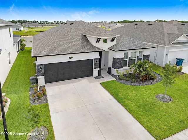 2365 Roygaris St NW, Palm Bay, FL 32907 - view of front facade with a garage, roof with shingles, a residential view, and stone siding
