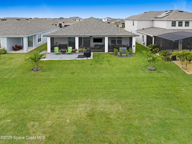 2365 Roygaris St NW, Palm Bay, FL 32907 - back of property with a patio area, central AC, a lawn, and a residential view