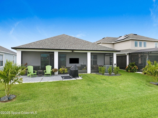 2365 Roygaris St NW, Palm Bay, FL 32907 - rear view of property featuring roof with shingles, a patio area, a yard, and stucco siding