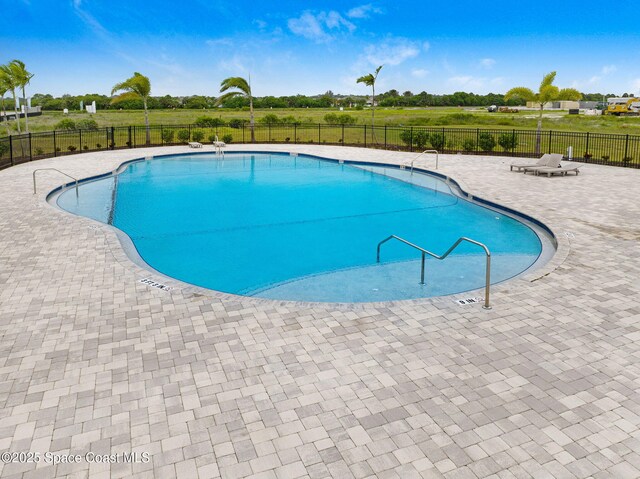 2365 Roygaris St NW, Palm Bay, FL 32907 - community pool featuring a patio