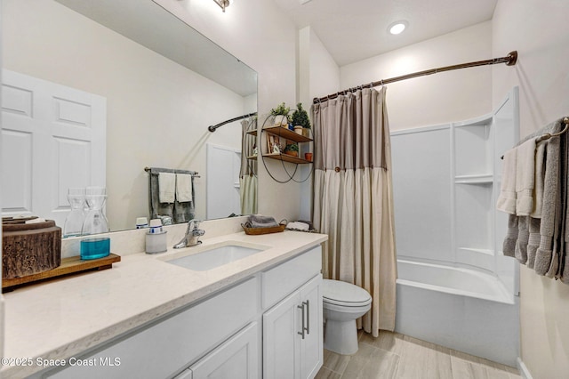 2365 Roygaris St NW, Palm Bay, FL 32907 - bathroom featuring vanity, shower / tub combo with curtain, toilet, and recessed lighting