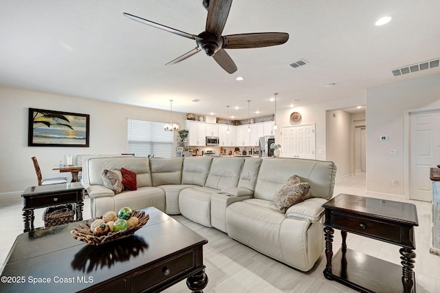 2365 Roygaris St NW, Palm Bay, FL 32907 - living room with ceiling fan, recessed lighting, and baseboards