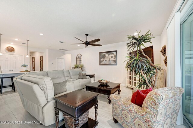 2365 Roygaris St NW, Palm Bay, FL 32907 - living room featuring ceiling fan and recessed lighting