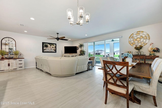 2365 Roygaris St NW, Palm Bay, FL 32907 - dining room with a ceiling fan, a chandelier, recessed lighting, and baseboards