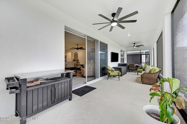 2365 Roygaris St NW, Palm Bay, FL 32907 - sunroom featuring ceiling fan and an outdoor hangout area