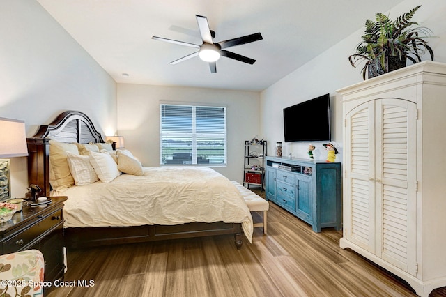 2365 Roygaris St NW, Palm Bay, FL 32907 - bedroom featuring light wood-style floors and ceiling fan