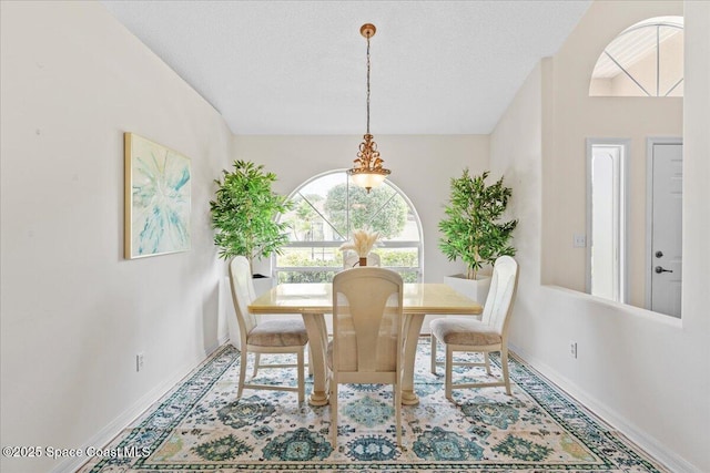 1090 Spring Oak Dr, Melbourne, FL 32901 - dining area featuring a chandelier and baseboards