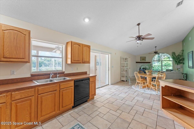1090 Spring Oak Dr, Melbourne, FL 32901 - kitchen featuring black dishwasher, ceiling fan, healthy amount of natural light, lofted ceiling, and open floor plan