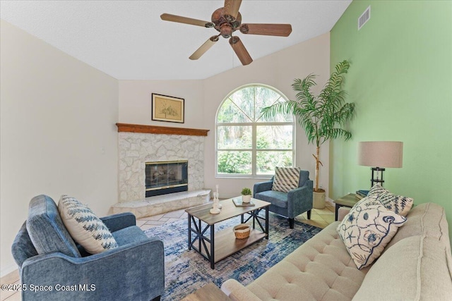 1090 Spring Oak Dr, Melbourne, FL 32901 - living area with a ceiling fan, vaulted ceiling, and a fireplace