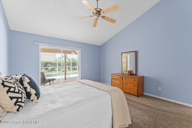 1090 Spring Oak Dr, Melbourne, FL 32901 - carpeted bedroom with access to exterior, a textured ceiling, vaulted ceiling, and ceiling fan
