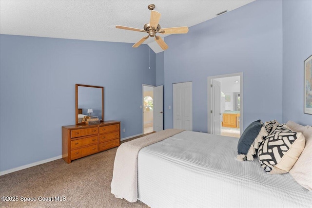 1090 Spring Oak Dr, Melbourne, FL 32901 - bedroom with high vaulted ceiling, carpet flooring, connected bathroom, a ceiling fan, and a closet