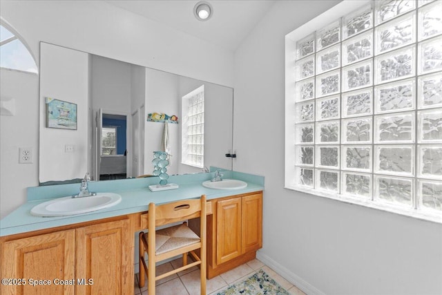 1090 Spring Oak Dr, Melbourne, FL 32901 - full bathroom with double vanity and tile patterned floors