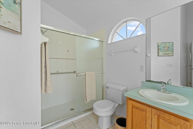 1090 Spring Oak Dr, Melbourne, FL 32901 - full bathroom with a shower stall, vanity, tile patterned floors, and vaulted ceiling