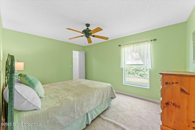1090 Spring Oak Dr, Melbourne, FL 32901 - bedroom featuring carpet flooring, a ceiling fan, and a textured ceiling