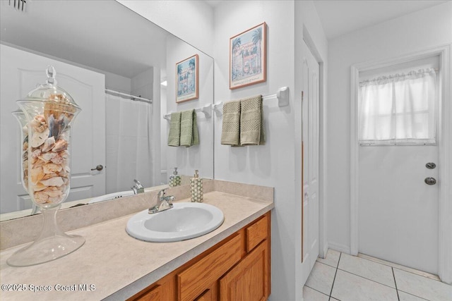 1090 Spring Oak Dr, Melbourne, FL 32901 - full bath featuring vanity and tile patterned floors