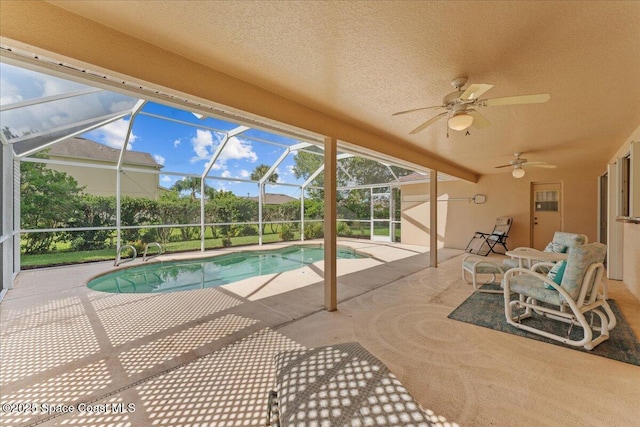 1090 Spring Oak Dr, Melbourne, FL 32901 - outdoor pool featuring a patio, ceiling fan, and a lanai