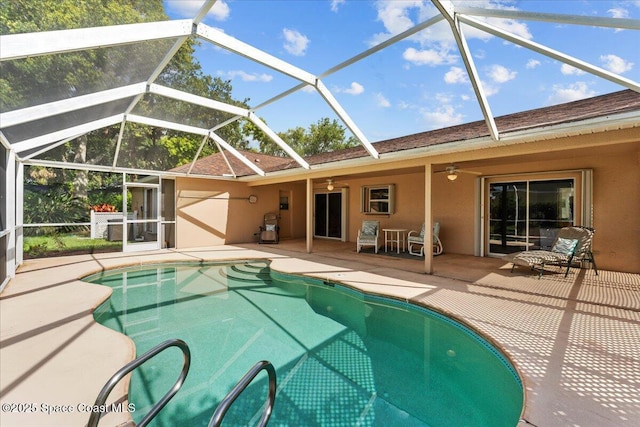 1090 Spring Oak Dr, Melbourne, FL 32901 - outdoor pool featuring a ceiling fan, a patio, and glass enclosure