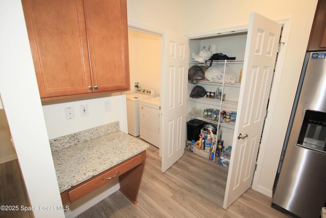 8342 Laguna Cir, Micco, FL 32976 - pantry featuring washer and dryer