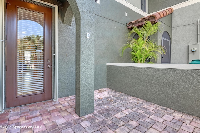 681 Ventura Dr, Satellite Beach, FL 32937 - entrance to property featuring stucco siding