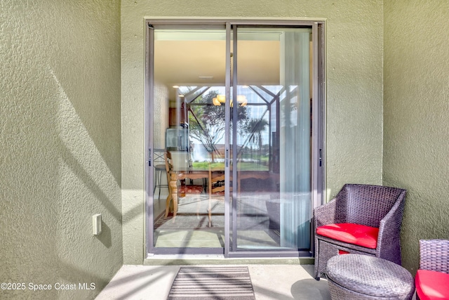 681 Ventura Dr, Satellite Beach, FL 32937 - property entrance with stucco siding