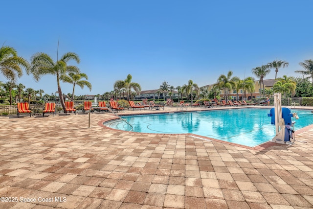 681 Ventura Dr, Satellite Beach, FL 32937 - community pool with a patio area