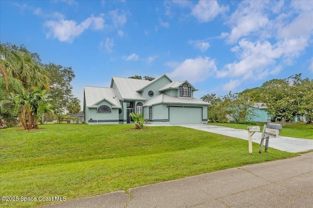 817 Seven Gables Cir SE, Palm Bay, FL 32909 - view of front of house with driveway, a garage, and metal roof