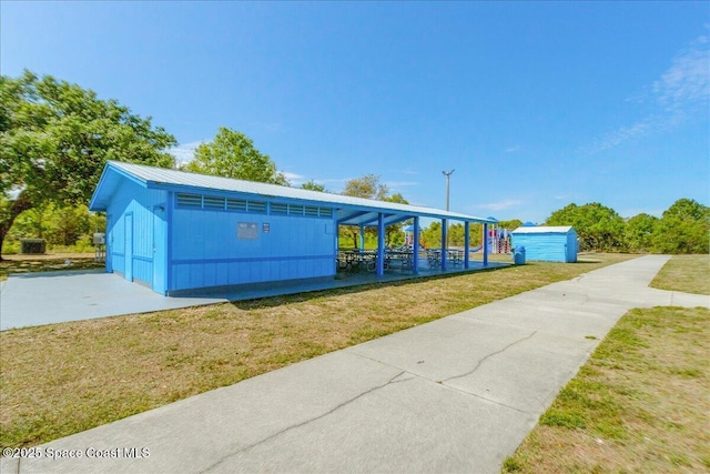 817 Seven Gables Cir SE, Palm Bay, FL 32909 - garage featuring a storage shed