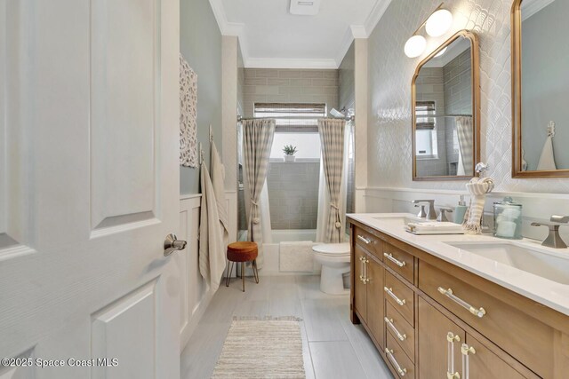 105 38th Ct, Vero Beach, FL 32968 - full bath with ornamental molding, shower / bath combo, double vanity, toilet, and tile patterned flooring