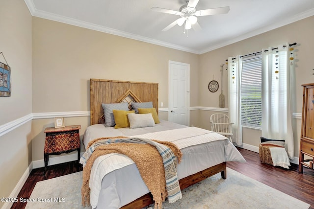 105 38th Ct, Vero Beach, FL 32968 - bedroom featuring wood finished floors, crown molding, baseboards, and a ceiling fan