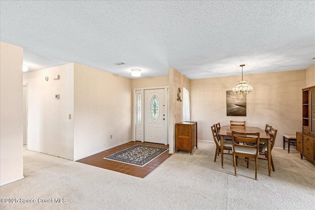 1181 Fairway Ct NE, Palm Bay, FL 32905 - foyer featuring carpet, a chandelier, and a textured ceiling