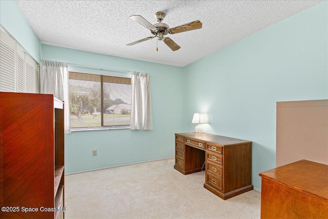 1181 Fairway Ct NE, Palm Bay, FL 32905 - unfurnished office with a ceiling fan, light colored carpet, and a textured ceiling
