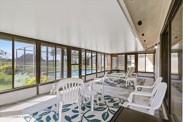 1181 Fairway Ct NE, Palm Bay, FL 32905 - sunroom with healthy amount of natural light