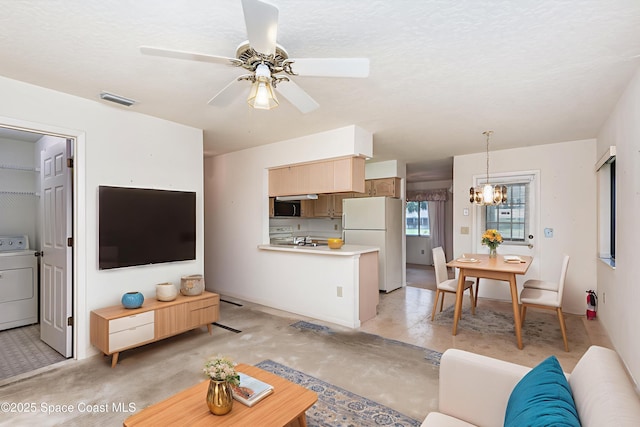 1080 Mayflower Ave, Melbourne, FL 32940 - living area with washer / dryer, concrete floors, a chandelier, and a ceiling fan
