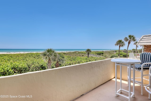 5050 Ocean Beach Blvd Unit 309, Cocoa Beach, FL 32931 - balcony featuring view of water and beach