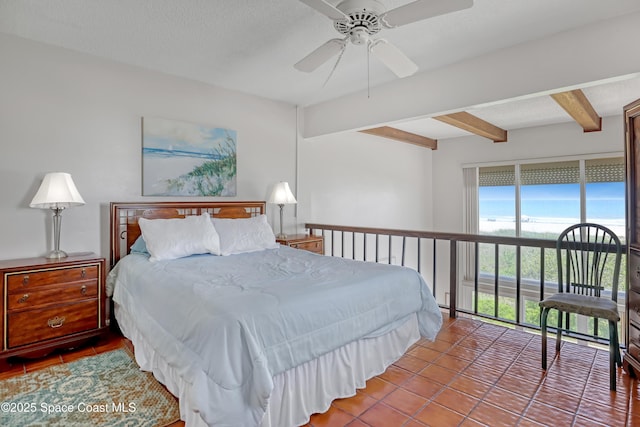 5050 Ocean Beach Blvd Unit 309, Cocoa Beach, FL 32931 - bedroom featuring beamed ceiling, tile patterned flooring, access to outside, and a ceiling fan