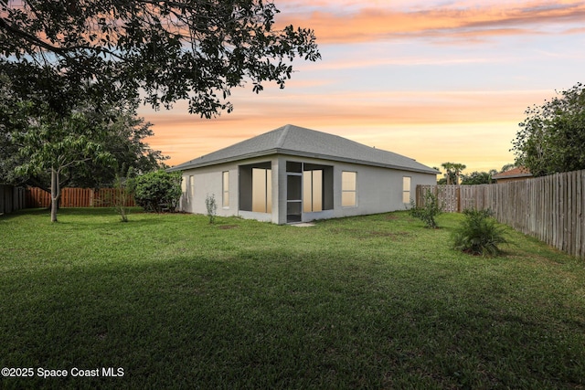 1609 Kestrel Ct, Rockledge, FL 32955 - rear view of house with stucco siding