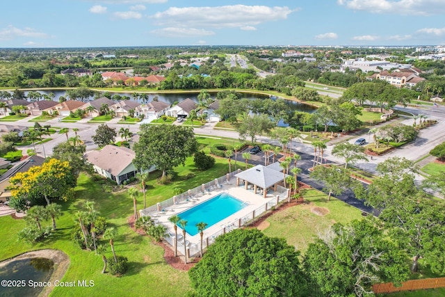 1609 Kestrel Ct, Rockledge, FL 32955 - aerial view of residential area with a pool and a large body of water