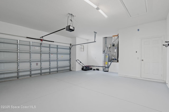 1609 Kestrel Ct, Rockledge, FL 32955 - garage with a garage door opener and water heater