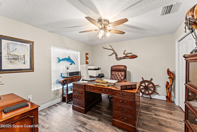 6435 Dixie Way, Mims, FL 32754 - office area featuring ceiling fan, wood finished floors, baseboards, and a textured ceiling