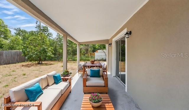 4415 Shaw Ave, Titusville, FL 32780 - view of patio / terrace featuring an outdoor living space