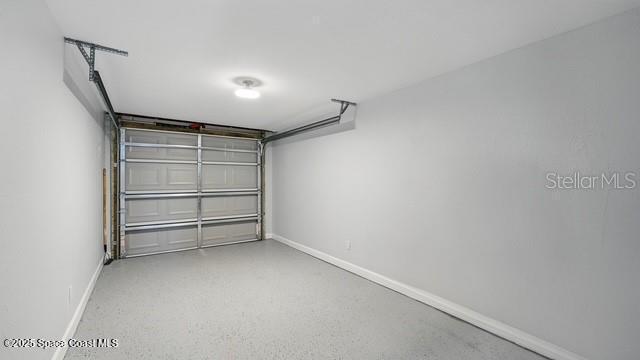 4415 Shaw Ave, Titusville, FL 32780 - garage with baseboards