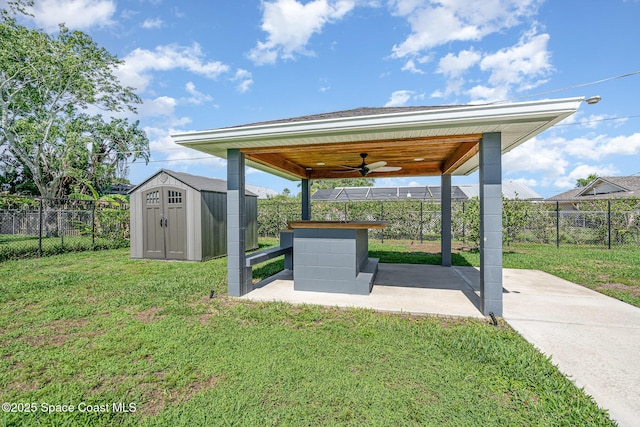 490 Candlestick Ave NE, Palm Bay, FL 32907 - view of yard featuring a ceiling fan and a patio area