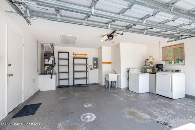 490 Candlestick Ave NE, Palm Bay, FL 32907 - garage with independent washer and dryer, electric panel, a garage door opener, heating unit, and a sink